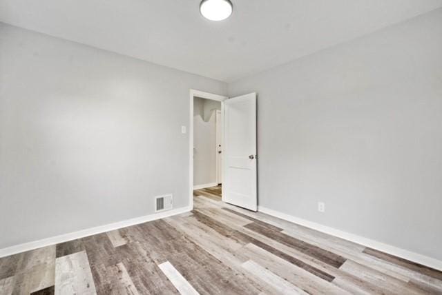 444 27th St, Mckeesport, PA 15132 - empty room featuring wood finished floors and baseboards
