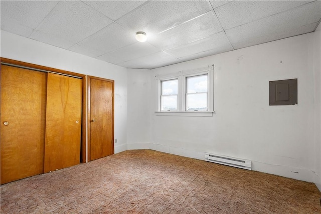 625 N Main St, City Of Washington, PA 15301 - unfurnished bedroom with a baseboard radiator, electric panel, carpet, a closet, and a drop ceiling