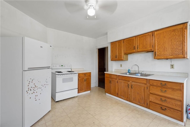 625 N Main St, City Of Washington, PA 15301 - kitchen featuring white appliances, light countertops, and brown cabinets