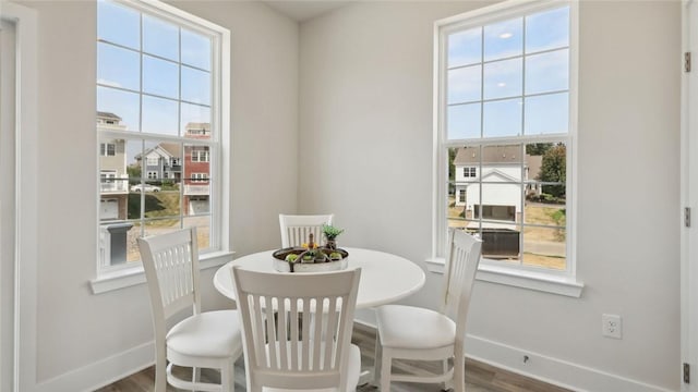 527 Cooper St Unit 3, Mccandless, PA 15090 - dining space featuring wood finished floors and healthy amount of natural light