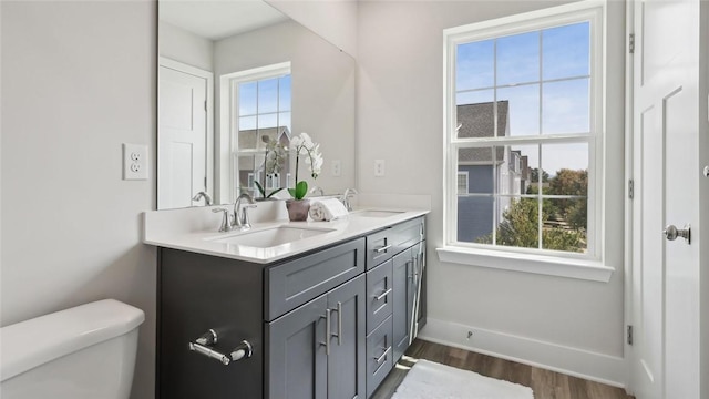 527 Cooper St Unit 3, Mccandless, PA 15090 - full bathroom featuring double vanity and wood finished floors