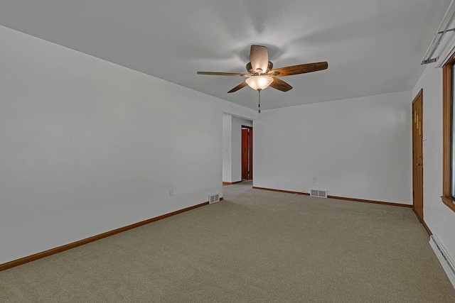 105 Eakin Dr, Brighton Twp, PA 15009 - unfurnished room with a baseboard heating unit, a ceiling fan, and light carpet