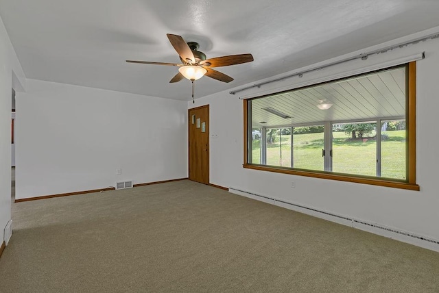 105 Eakin Dr, Brighton Twp, PA 15009 - spare room featuring baseboard heating, carpet, and a ceiling fan