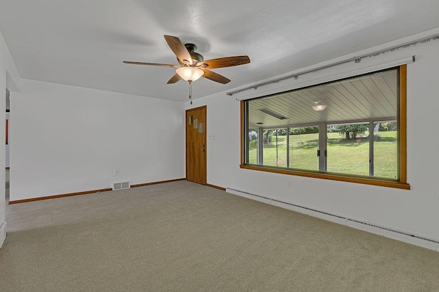 105 Eakin Dr, Brighton Twp, PA 15009 - unfurnished room featuring a baseboard heating unit, carpet floors, and a ceiling fan