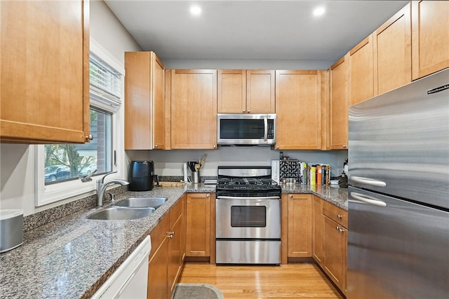 30 S 18th St, South Side, PA 15203 - kitchen with appliances with stainless steel finishes, plenty of natural light, dark stone counters, and recessed lighting