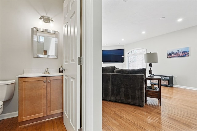 30 S 18th St, South Side, PA 15203 - bathroom featuring vanity, hardwood / wood-style floors, and recessed lighting