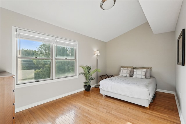 30 S 18th St, South Side, PA 15203 - bedroom with light wood finished floors and lofted ceiling
