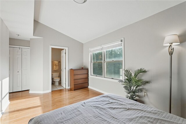 30 S 18th St, South Side, PA 15203 - bedroom featuring wood finished floors, lofted ceiling, and ensuite bathroom