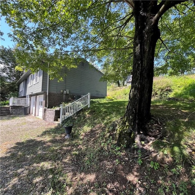 503 Bagdad Rd, Allegheny Twp, PA 15656 - view of yard with a garage and driveway