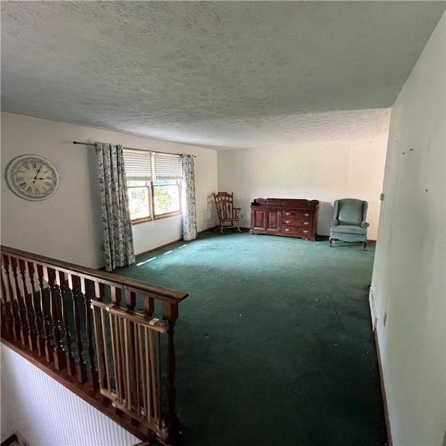 503 Bagdad Rd, Allegheny Twp, PA 15656 - unfurnished living room featuring carpet floors and a textured ceiling