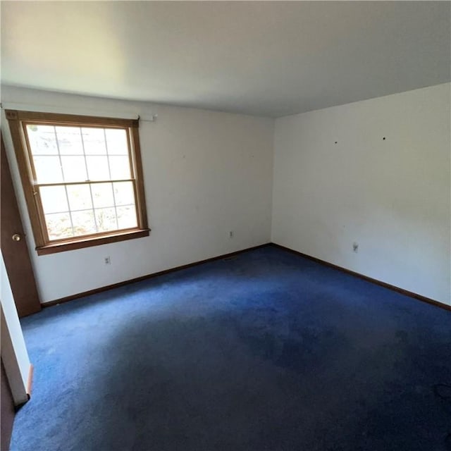 503 Bagdad Rd, Allegheny Twp, PA 15656 - empty room featuring dark colored carpet
