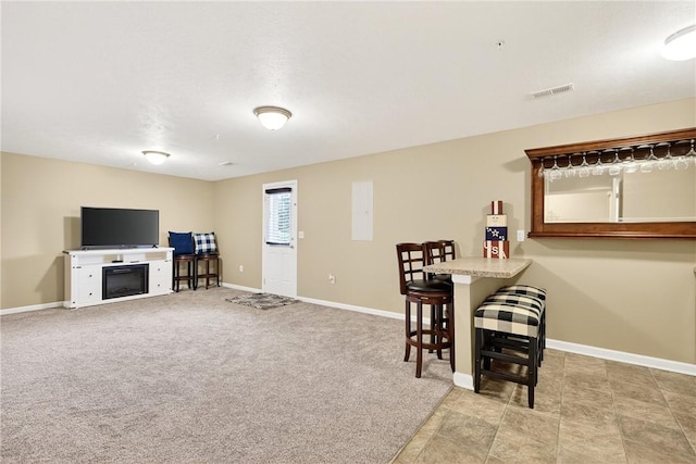 2000 Moccasin Dr, South Strabane, PA 15301 - dining space with a fireplace and light carpet
