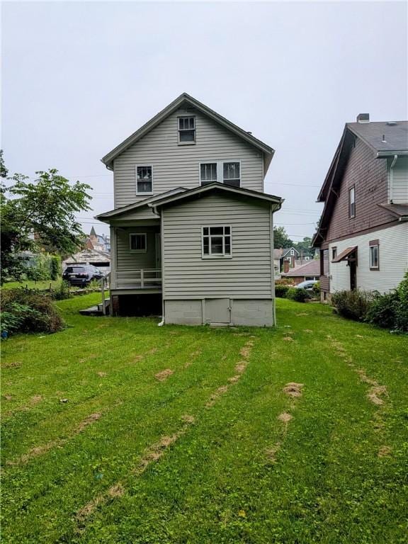1819 Scott St, Mckeesport, PA 15132 - back of property featuring a yard