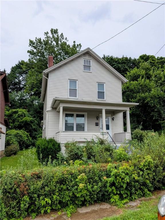 1819 Scott St, Mckeesport, PA 15132 - american foursquare style home with a chimney and a porch