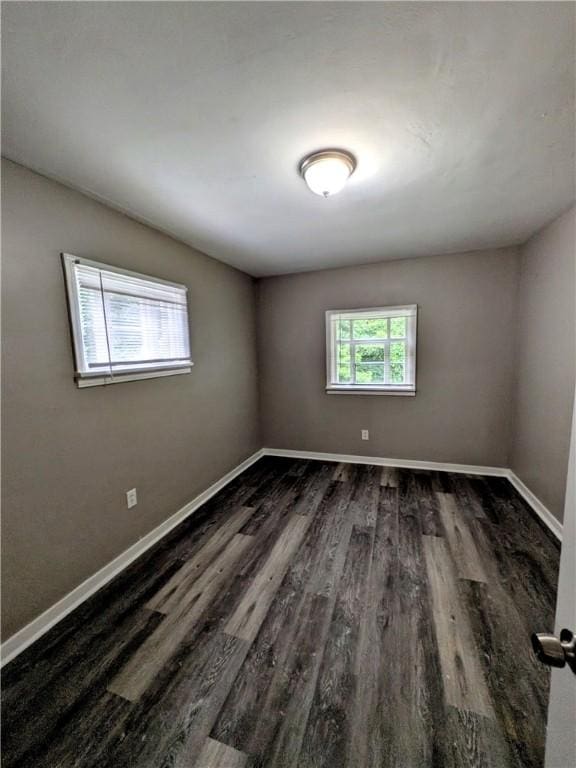 1819 Scott St, Mckeesport, PA 15132 - unfurnished room featuring dark wood-style floors and baseboards