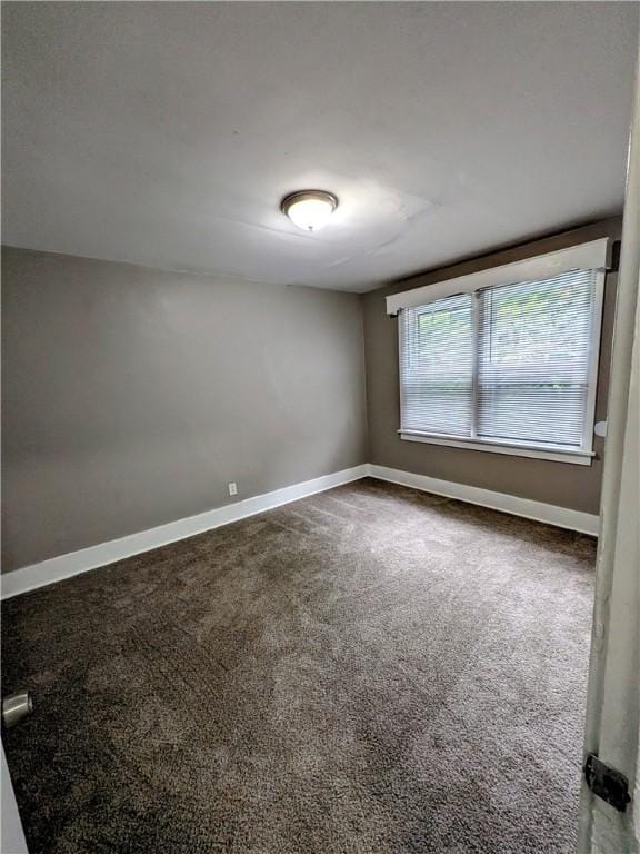 1819 Scott St, Mckeesport, PA 15132 - carpeted empty room with baseboards