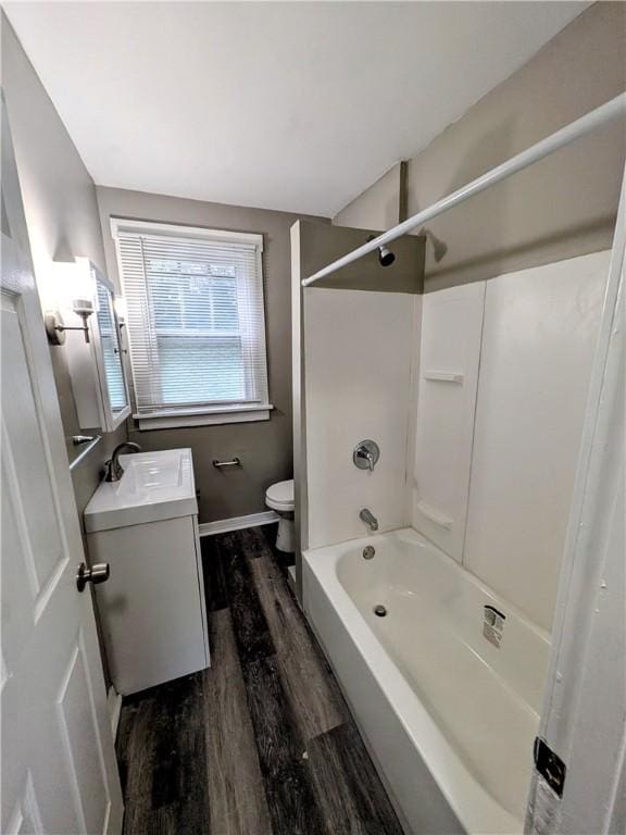1819 Scott St, Mckeesport, PA 15132 - bathroom with vanity, wood finished floors, and shower / bath combination