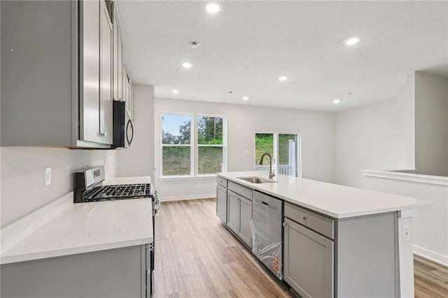 118 River Ridge Drive, Moon/Crescent Twp, PA 15108 - kitchen featuring gray cabinets, stainless steel appliances, light wood finished floors, light countertops, and recessed lighting
