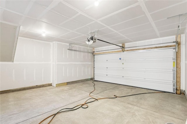 118 River Ridge Drive, Moon/Crescent Twp, PA 15108 - garage featuring baseboards and a garage door opener