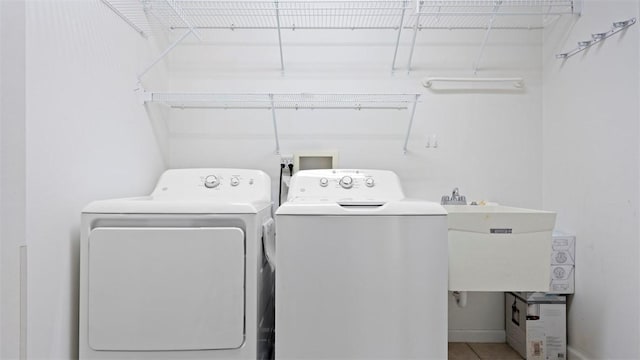 224 Adams Pointe Blvd Unit 1, Adams Twp, PA 16046 - laundry room with washing machine and clothes dryer and tile patterned floors