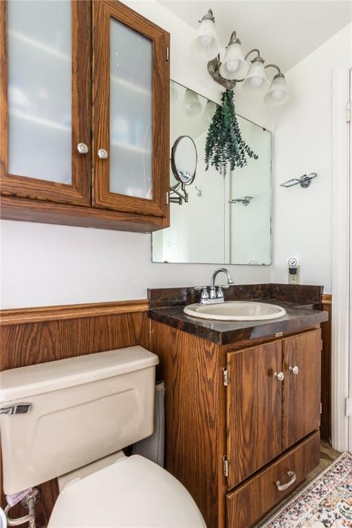 1029 3rd St, Baden, PA 15005 - bathroom featuring toilet and vanity