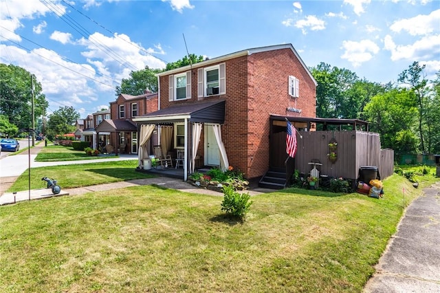 1029 3rd St, Baden, PA 15005 - view of front of house with brick siding and a front yard