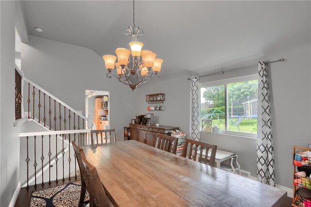1445 Raven Dr, Pittsburgh, PA 15243 - dining space with a chandelier, lofted ceiling, and stairway