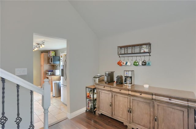 1445 Raven Dr, Pittsburgh, PA 15243 - hall featuring vaulted ceiling, wood finished floors, and stairway