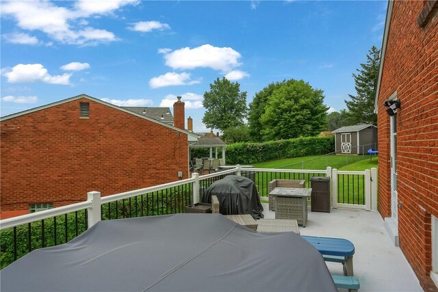 1445 Raven Dr, Pittsburgh, PA 15243 - view of patio featuring a shed, a wooden deck, outdoor dining space, and area for grilling