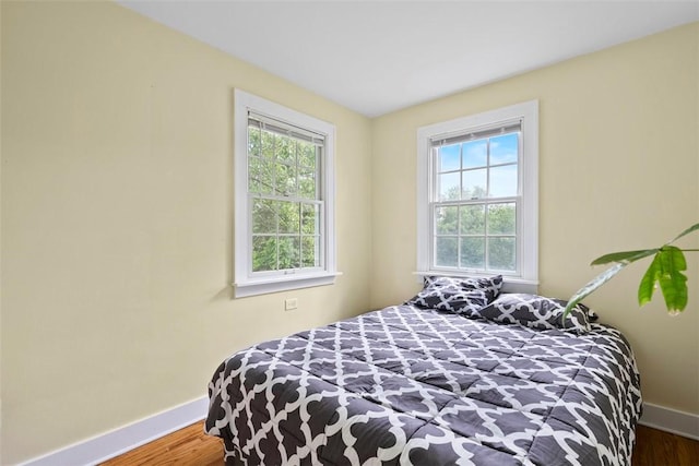 2324 Mcaleer Rd, Franklin Park, PA 15143 - bedroom with multiple windows and wood finished floors