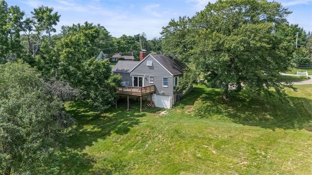 2324 Mcaleer Rd, Franklin Park, PA 15143 - rear view of house featuring a wooden deck, a garage, a yard, and a chimney