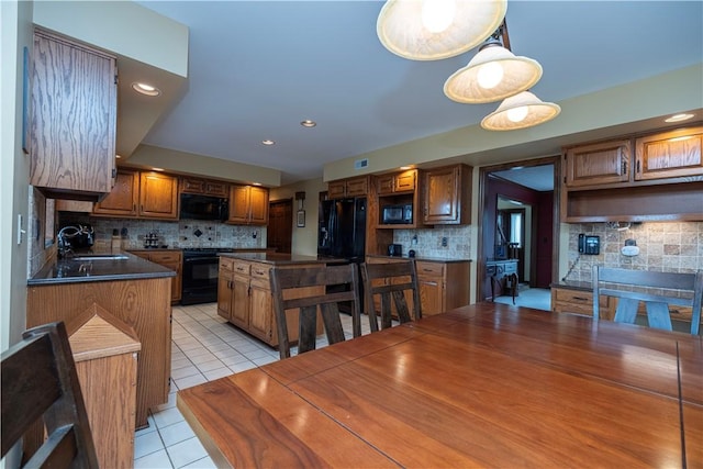 803 Birch Field Ct, Marshall, PA 15090 - kitchen featuring black appliances, dark countertops, backsplash, light tile patterned flooring, and recessed lighting