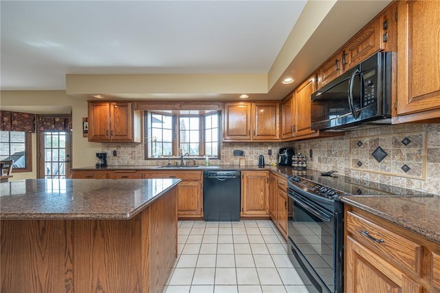 803 Birch Field Ct, Marshall, PA 15090 - kitchen featuring black appliances, brown cabinetry, light tile patterned flooring, backsplash, and recessed lighting