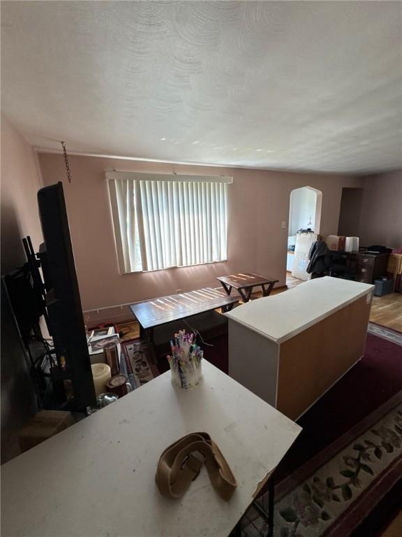155 Roosevelt Ave, Stowe Twp, PA 15136 - kitchen featuring a kitchen island and open floor plan