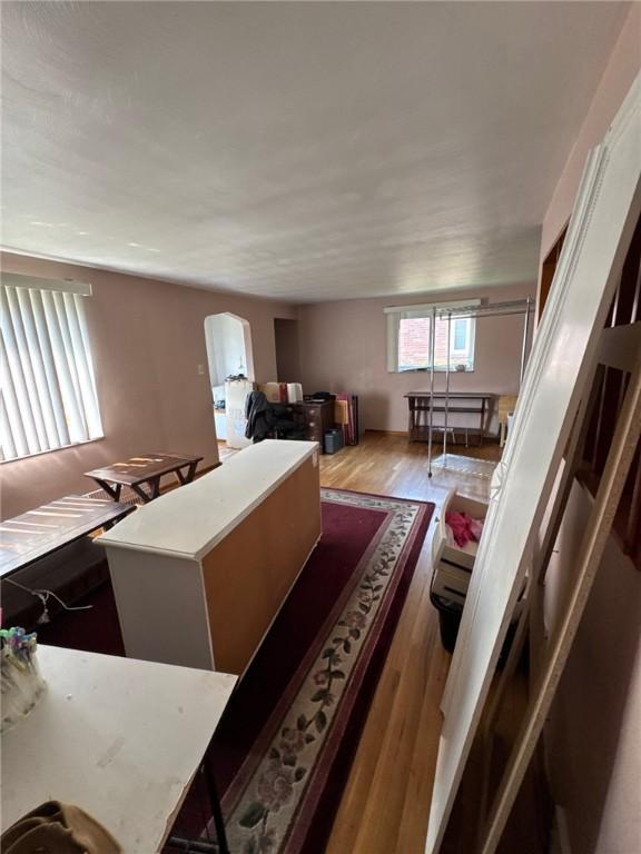 155 Roosevelt Ave, Stowe Twp, PA 15136 - living area with wood finished floors and arched walkways