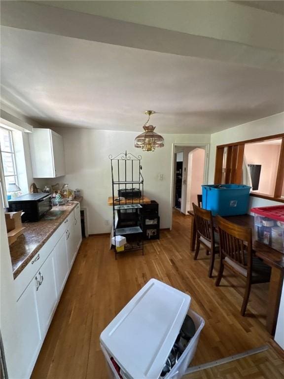 155 Roosevelt Ave, Stowe Twp, PA 15136 - living area featuring wood finished floors and arched walkways