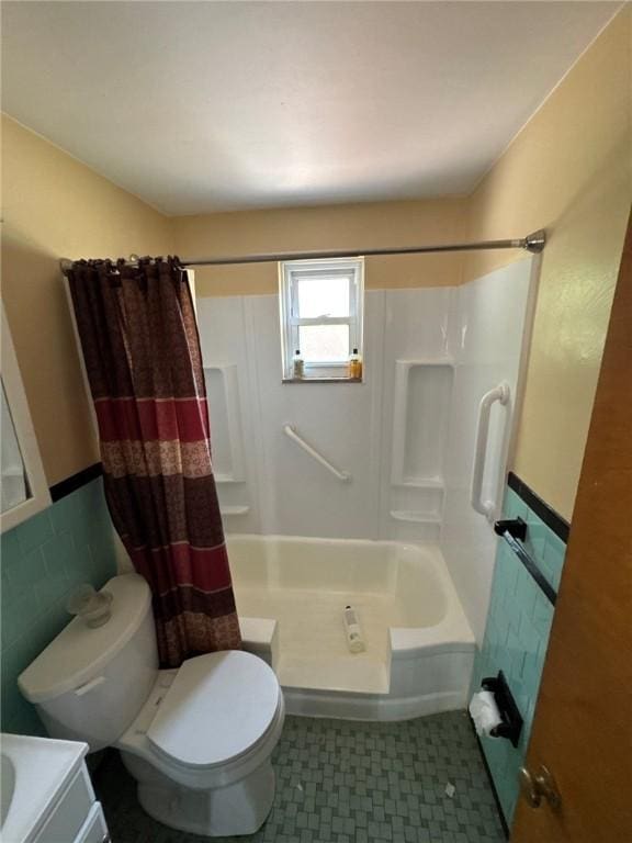 155 Roosevelt Ave, Stowe Twp, PA 15136 - full bathroom featuring a wainscoted wall, tile walls, and vanity