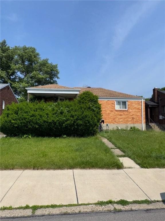 155 Roosevelt Ave, Stowe Twp, PA 15136 - view of side of property with brick siding