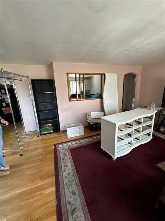 155 Roosevelt Ave, Stowe Twp, PA 15136 - living room featuring light wood finished floors and arched walkways