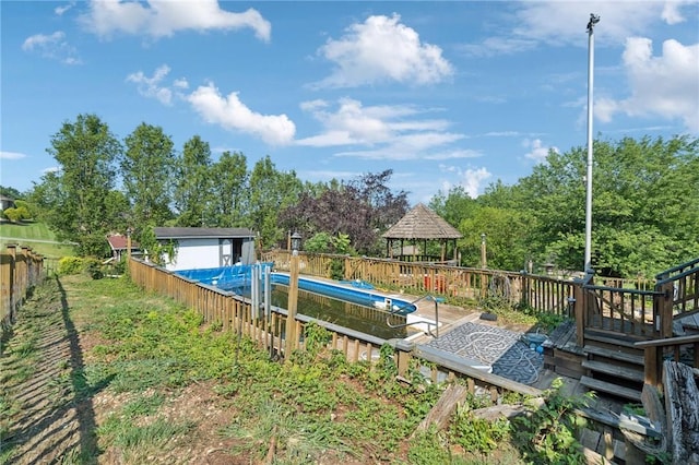 161 Thorne Dr N, Franklin Twp, PA 15301 - view of pool with a gazebo, a deck, and a fenced backyard