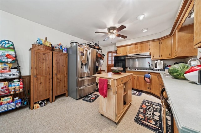 161 Thorne Dr N, Franklin Twp, PA 15301 - kitchen with stainless steel fridge, under cabinet range hood, light countertops, and black oven
