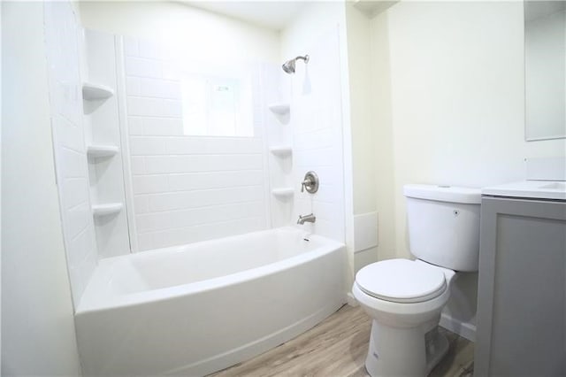 1460 Guffey Rd, North Huntingdon, PA 15642 - bathroom featuring wood finished floors, vanity, and bathing tub / shower combination