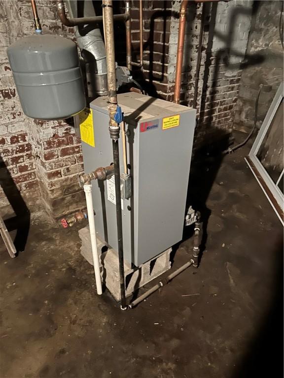 3134-3136 Huxley St, Sheraden, PA 15204 - utility room featuring a heating unit