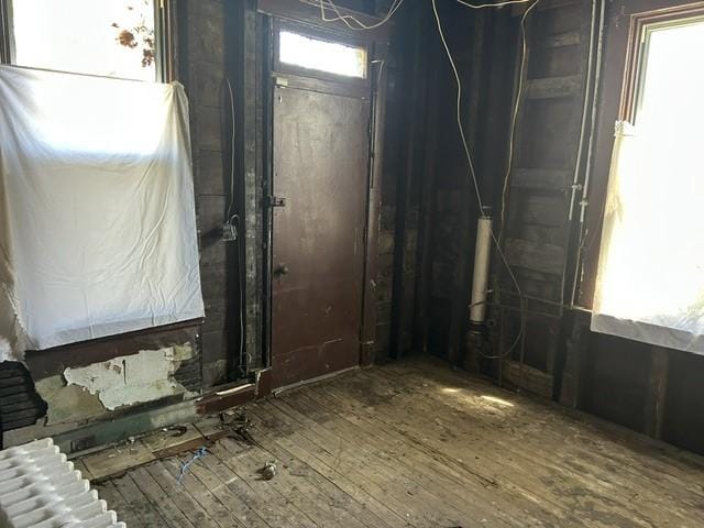 3134-3136 Huxley St, Sheraden, PA 15204 - entryway featuring radiator, wood-type flooring, and healthy amount of natural light