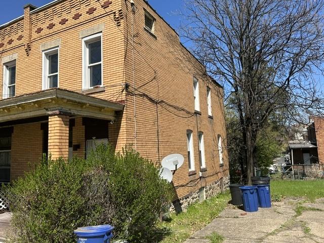 3134-3136 Huxley St, Sheraden, PA 15204 - view of side of home with brick siding
