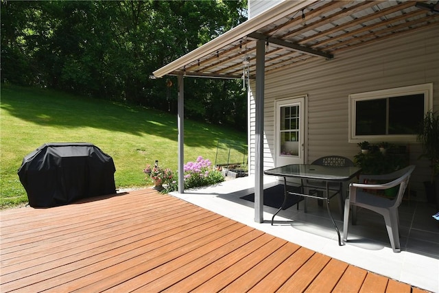 226 Johnston St, Cecil, PA 15057 - wooden deck with a lawn, a patio area, outdoor dining area, and a grill