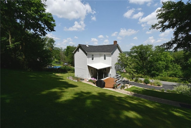 226 Johnston St, Cecil, PA 15057 - rear view of property featuring a chimney and a yard