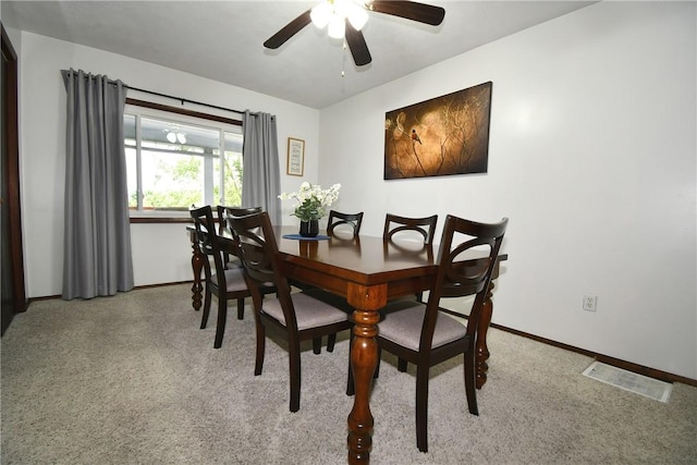 226 Johnston St, Cecil, PA 15057 - dining area featuring a ceiling fan and carpet floors