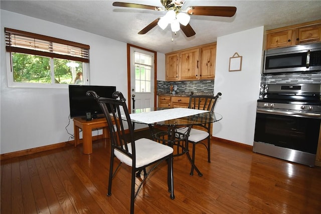 226 Johnston St, Cecil, PA 15057 - dining area featuring dark wood-type flooring and ceiling fan