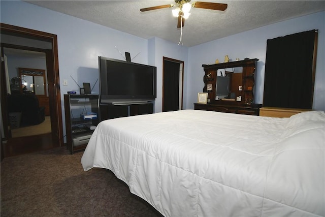 226 Johnston St, Cecil, PA 15057 - bedroom featuring a textured ceiling, carpet, and a ceiling fan